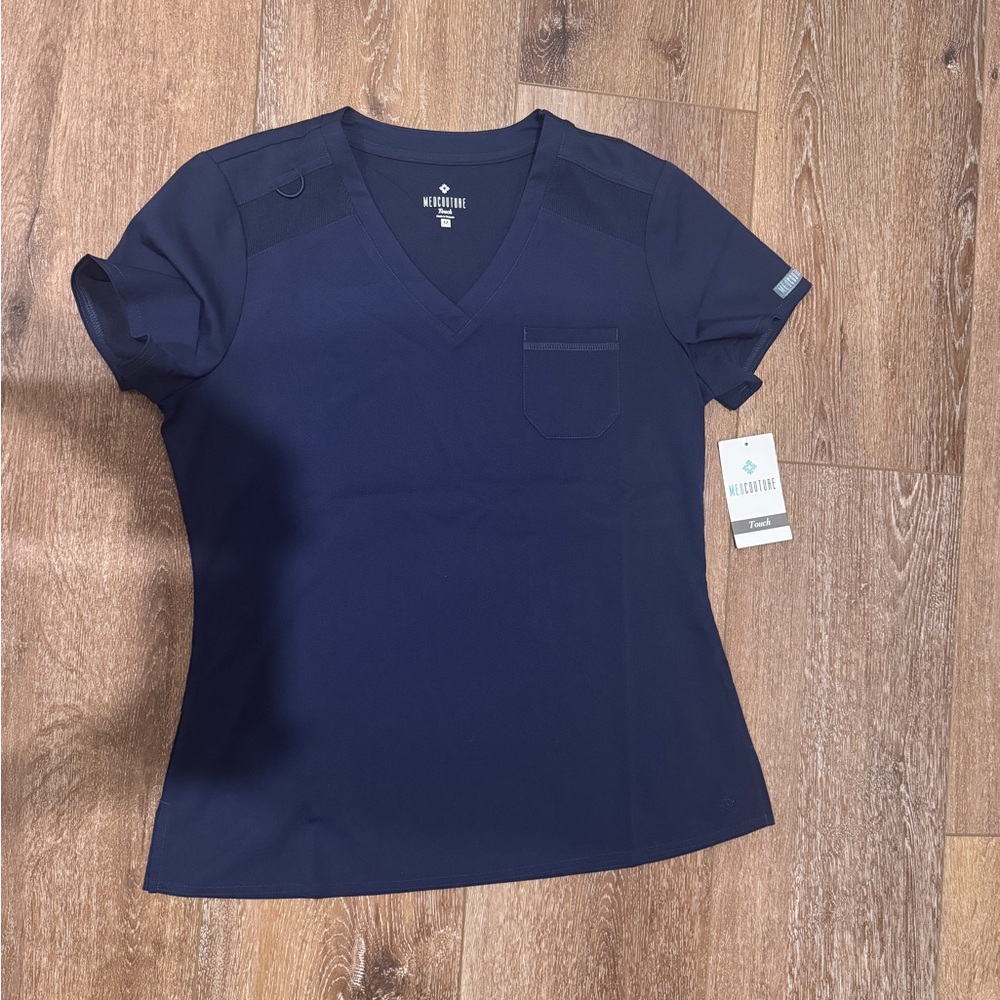 Medcouture scrub top navy size large. New with tags.